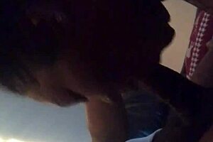 Beautiful black girl gives a deepthroat blowjob to a big cock
