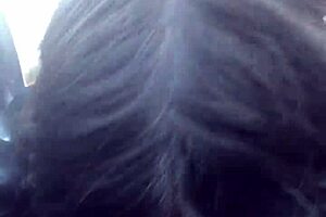 Beautiful amateur gives a deepthroat blowjob to a big black cock in a car