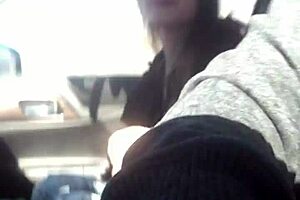 Beautiful amateur gives a deepthroat blowjob to a big black cock in a car