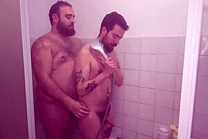Fat gay gets a big cock in his ass in the shower