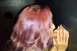 See hot girls flashing and getting blown in a gloryhole