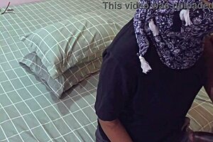 Horny Asian girl seduces friend for a hot bedroom encounter