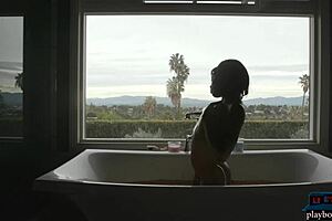 The tall black MILF model, Ana Foxxx, undresses and has a hot bath