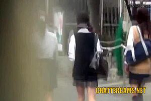 College girls urinate in the great outdoors in public
