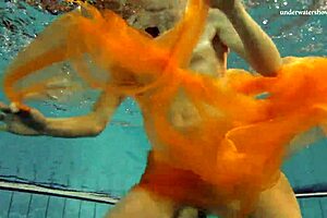 Nastya's outdoor striptease in the pool is hot