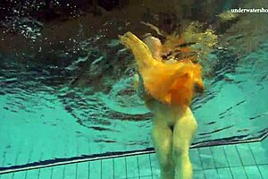 Nastya's outdoor striptease in the pool is hot