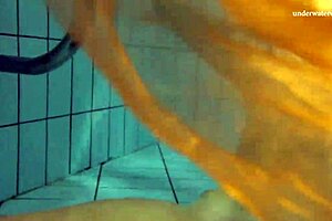 Nastya's outdoor striptease in the pool is hot