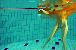 Nastya's outdoor striptease in the pool is hot