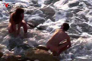 Public beach fun with an amateur couple and their friends