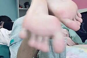 Young Asian boy enjoys foot fetish and gets fucked in the ass