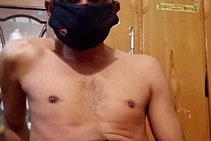 Steamy scene of a gay Muslim boy with a big cock enjoying a sensual massage with oil