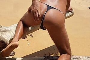 Amateur gay Ladysilva shows off his ass on the beach