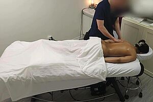 Skinny teen gets a hot massage from a sexy masseuse