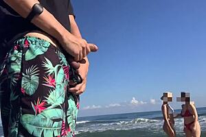 Public masturbation on the beach with willing participants