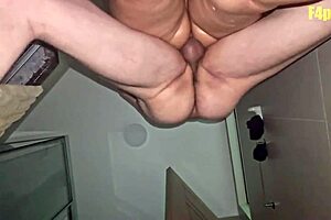 Amateur couple's loud moans in bathroom anal sex scene