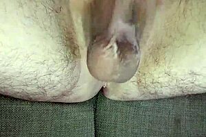 Solo pleasure with an uncut cock