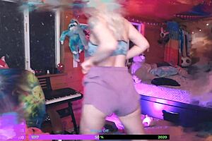 A beautiful blonde camgirl shows off her body and especially her big ass and natural tits