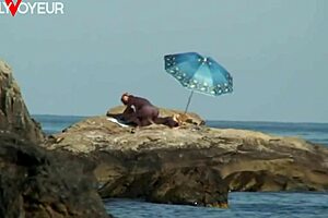 Sun-soaked outdoor sex act caught on camera publicly