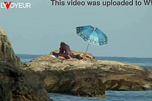 Sun-soaked outdoor sex act caught on camera publicly