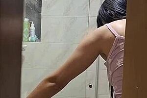 Asian roommate's solo shower session caught on camera