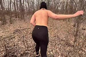 A blonde gets undressed and has sex in the woods