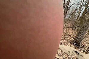 A blonde gets undressed and has sex in the woods