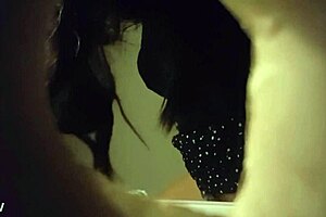 Spy cam video of a babe peeing through a wall hole