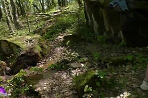 A girl walked in the forest and got excited