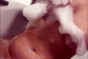 Horny British slut masturbating in the shower