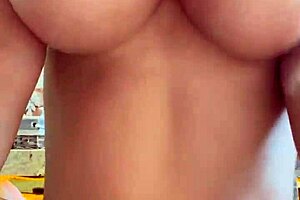 Monika Fox makes a sexy pose and wanks her pussy in the bathroom