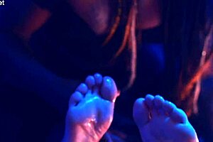 Foot fetish and femdom with the emphasis on foot play, featuring a mix of kinky and teasing content