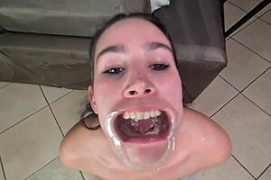Video of a human toilet used for piss drinking and swallowing